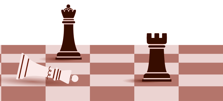 A queen knocked over alongside another queen and rook on a chessboard